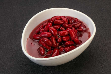 Red baked kidney bean in the bowl with sauceの写真素材