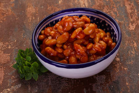 Baked kidney with tomato sauce in the bowlの写真素材