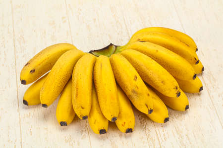 Ripe sweet yellow Mini banana heapの写真素材