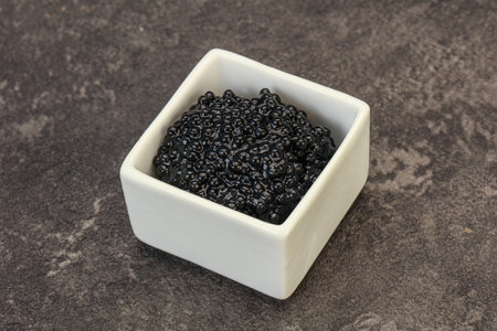 Luxury strugeon fish black caviar in the bowlの写真素材