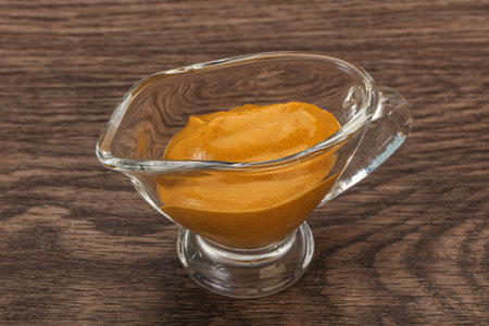 Spicy Mustard sauce in the bowlの写真素材