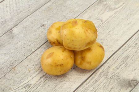 Young small seasonal potato heap ready for cookingの写真素材