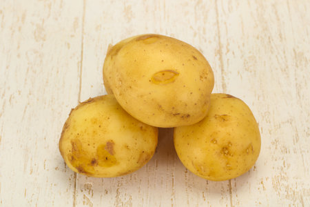 Young small seasonal potato heap ready for cookingの写真素材