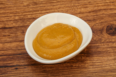 Spicy Mustard sauce in the bowlの写真素材