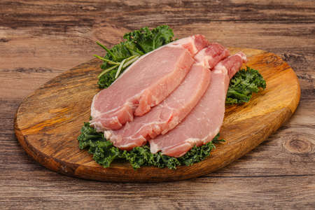Raw pork meat steak for cookingの写真素材