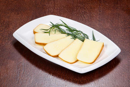 Caucasian tradition cheese plate served green herbsの写真素材