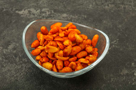 Spicy chili peanut snack in the bowlの写真素材