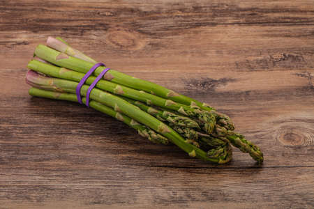 Vegan cuisine - Raw asparagus heap  for cookingの写真素材