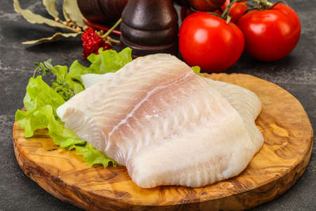 Raw pangasius fillet fish for cookingの写真素材