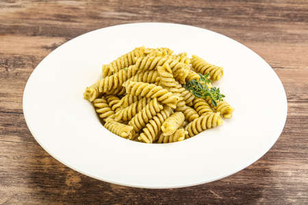 Italian pasta Fusilli with pesto sauceの写真素材