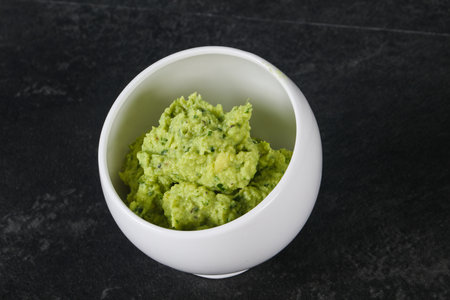 Spicy Avocado guacamole sauce with chili pepperの写真素材
