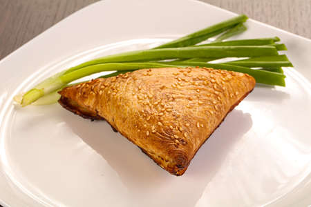 Asian Samosa pie with meat and onion