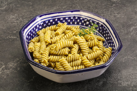 Italian pasta Fusilli with pesto sauceの写真素材
