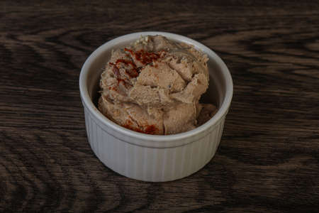 Herring butter spread in the bowl with spicesの写真素材