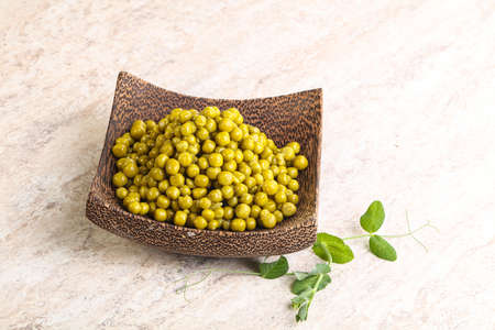 Marinated Young Green peas in the bowlの写真素材