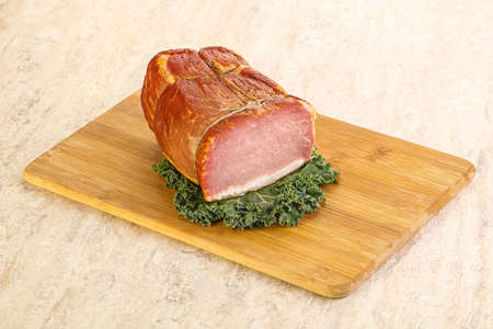 Delicous pork cured meat isolated over boardの写真素材