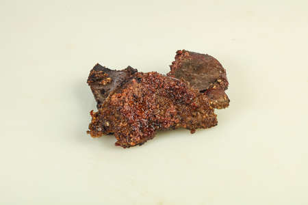 Roasted hot pork liver steak isolated