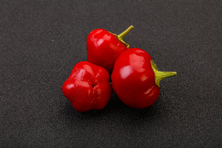 Red hot and spicy cherry pepperの写真素材