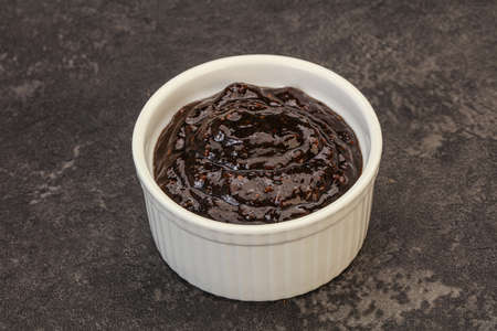 Black spicy Pepper sauce in the bowl
