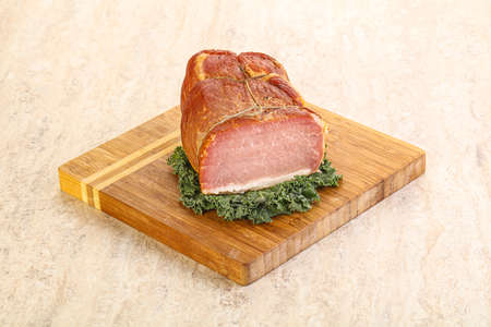 Delicous pork cured meat isolated over boardの写真素材