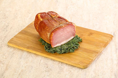 Delicous pork cured meat isolated over boardの写真素材