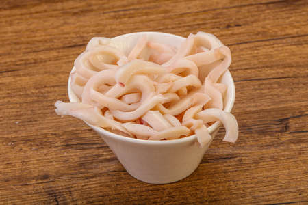 Tasty Marinated squid slices snack in the bowlの写真素材