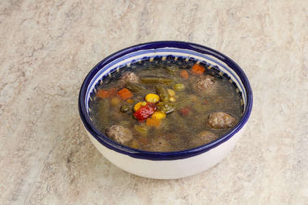 Tasty dietary soup with beef meatballs and vegetablesの写真素材