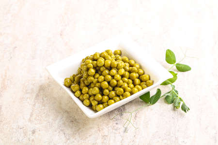 Marinated Young Green peas in the bowlの写真素材