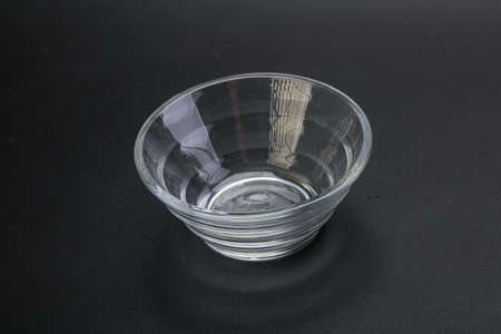 Epmty glass bowl for kitchen isolated bsckgroundの写真素材