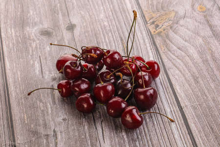 Ripe sweet juicy cherry berries heap