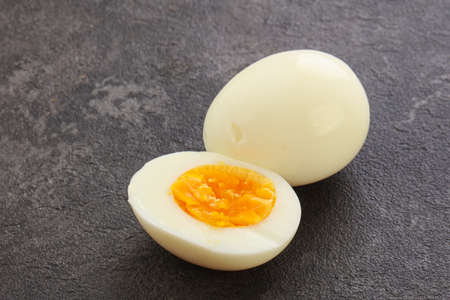 Boiled chicken egg for breakfast without eggshellの写真素材