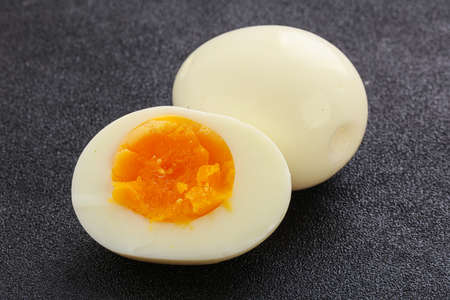 Boiled chicken egg for breakfast without eggshellの写真素材