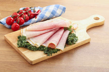 Tasty Pork ham snack over boardの写真素材