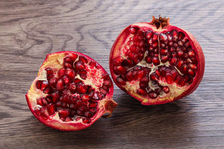 Ripe sweet rube juicy pomegranate fruitの写真素材