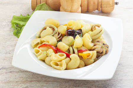 Pasta with baby octopus and bell pepperの写真素材