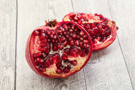 Ripe sweet rube juicy pomegranate fruitの写真素材