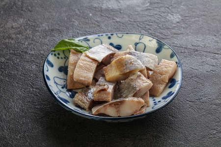 Sliced herring fillet in the bowl for snackの写真素材