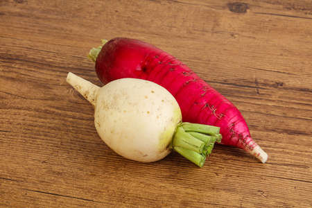Fresh ripe vegetable - daikon for vegan cuisineの写真素材