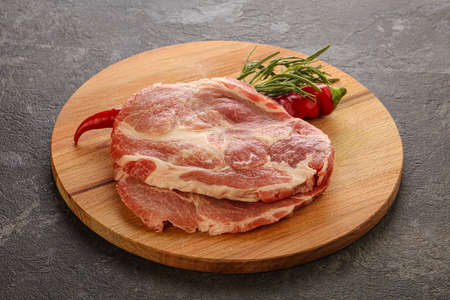 Raw pork meat neck steak for grillの写真素材