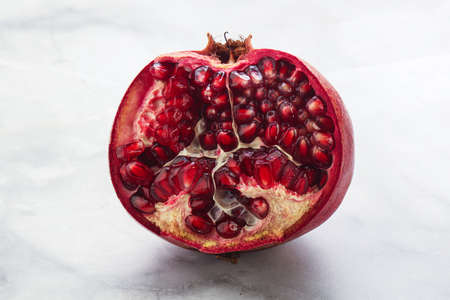 Ripe sweet rube juicy pomegranate fruitの写真素材
