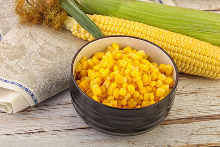 Canned yellow corn grain in the bowl