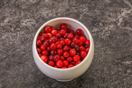 Sweet and tasty organic cranberry in the bowlの写真素材