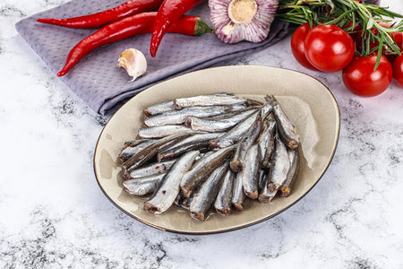 Pickled anchovy fish in the plateの写真素材