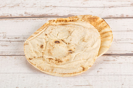 Traditional eastern round pita bread for breakfast