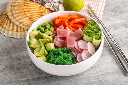 Hawaiian cuisine - poke with tuna, cucumber, chuka, edamame beans and rice