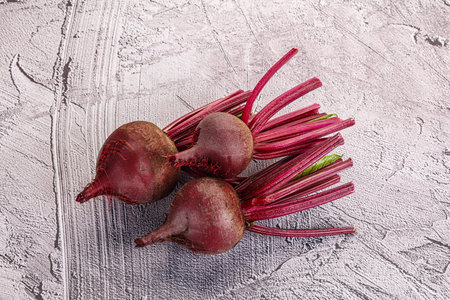 Young raw organic beetroot heap isolated