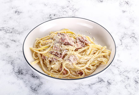 Classic pasta carbonara with bacon and parmesanの写真素材