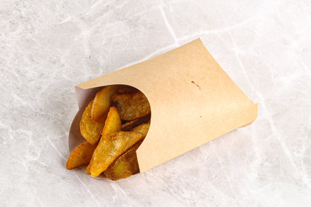 Fried rustic golden potato heap snackの写真素材