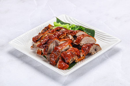 Asian cuisine - roasted duck meat with skinの写真素材