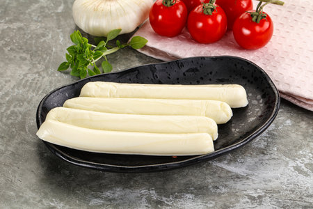 Mozzarella cheese stick heap snack appetizer